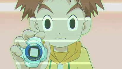 Menino mostrando digivice 