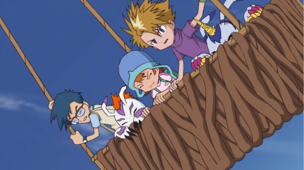 Yamato, Joe e Sora se equilibrando em Birdramon.