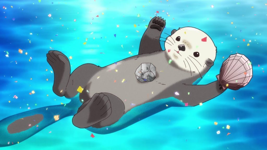 Lontra-marinha após ter sido aprovada.
A lontra está segurando uma concha e está com uma rocha