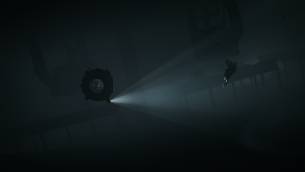 Protagonista do game side scrolling Inside navega em um pequeno submarino que só cabe uma pessoa. Seu holofote ilumina uma macabra sereia. Otageek