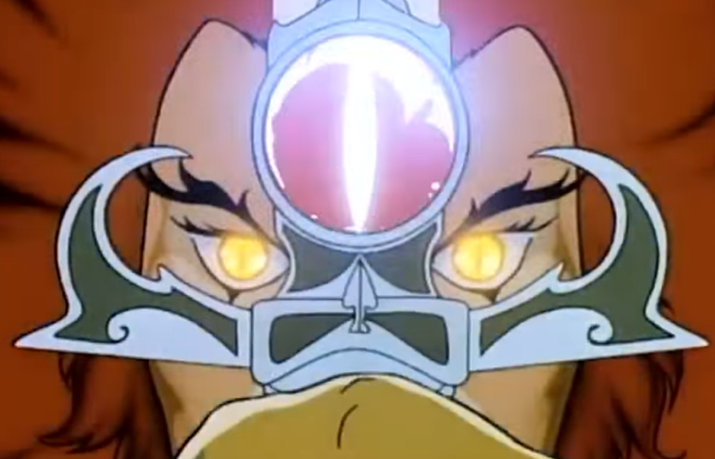 Lion, líder dos Thundercats leva a Espada Justiceira aos olhos para ganhar a Visão além do Alcance.